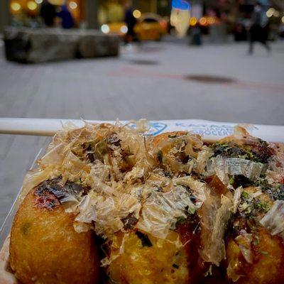 takoyaki. fried octopus balls. $4-$5