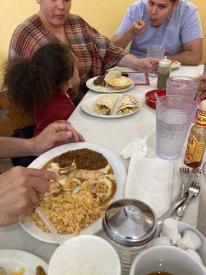 Rafasplate and at far end barbacoa taco and enchiladas plate