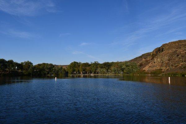 View from the lake, facing the swimming area, marina, some campsites.