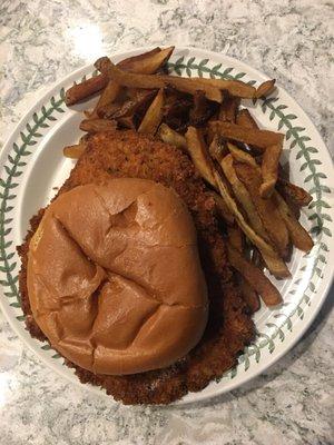 Pork schnitzel sandwich and fresh cut fries