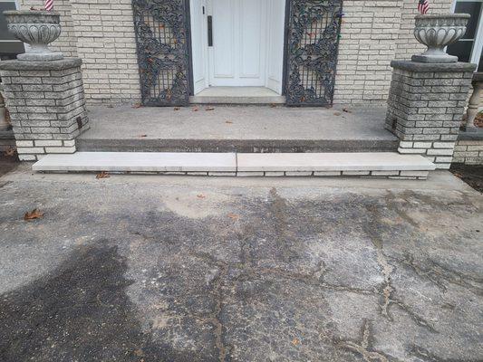 This is a photo of my porch step and foundation pillars restored with new brick and limestone.