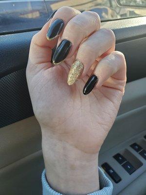 Tips with black gel and gold glitter