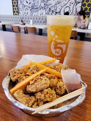 Popcorn chicken and a peach mango mojito.