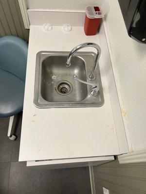 Unsterilized sink  Open doors no privacy.