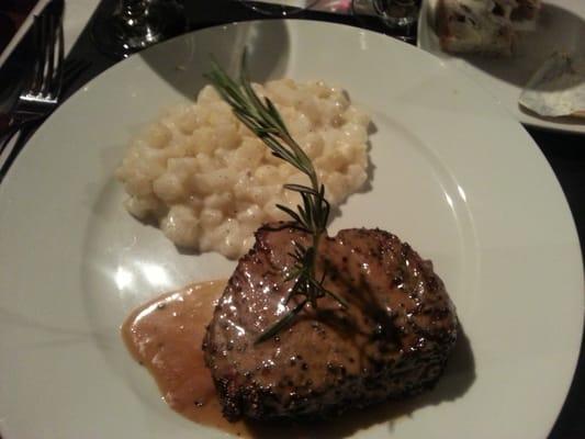 Filet in black peppercorn sauce w/cheesed potato cubes.