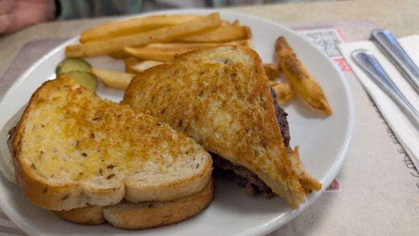 Patty Melt with home fries.