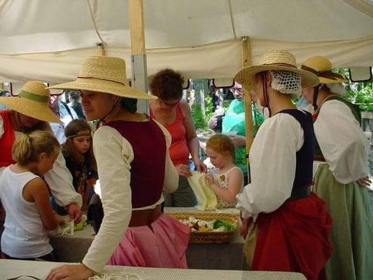 Poppets (children) making dolls