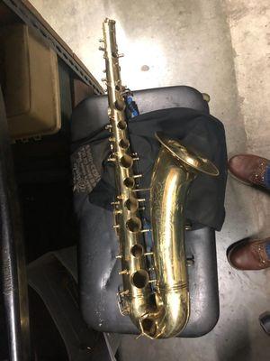 Non-functioning sax, all keys removed. The cone was cleaned and buffed.