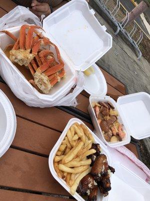 Snow crabs, garlic wings and potatoes and sausage - $45