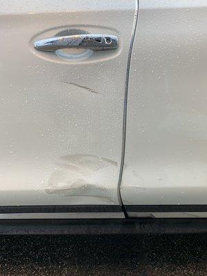 The damage done to my car while parked at Thrifty Car Parking Logan Boston in Revere.