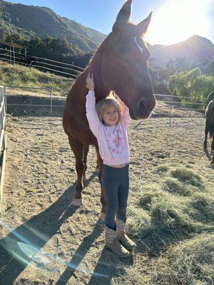 Kids lesson.  Billie with her horse Luna.