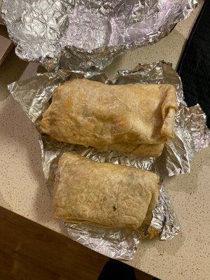 Two carnitas burritos, you tell me what's wrong with this picture for $9 each