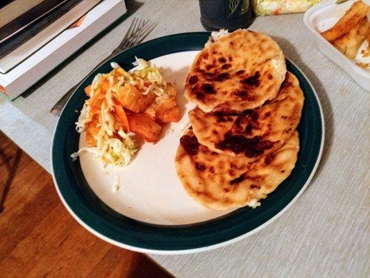 Cheese pupusas with a side of yuca fritas.