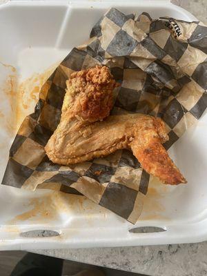 I forgot to take a picture of the chicken when we first got it but look how huge this chicken wing is compared to the to-go container!