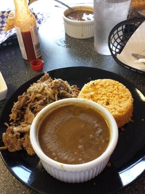 Pernil platter, roast pork w rice and beans.