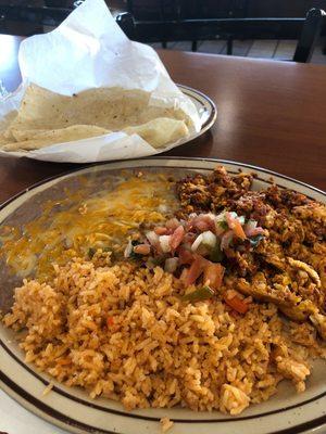 Chorizo and Eggs, Rice, Beans Flour Tortillas Breakfast .