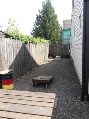 Cornhole or bean bag toss game.