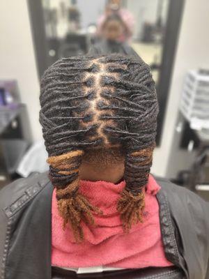 Loc retwist & style