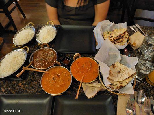 Lamb Rogan Josh, fish curry, chicken Tikka Masala, rice, naan.