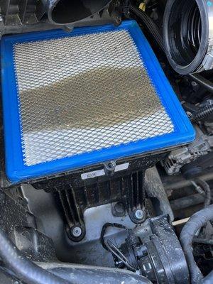 Air filter soaked in oil from them overfilling the engine with so much oil