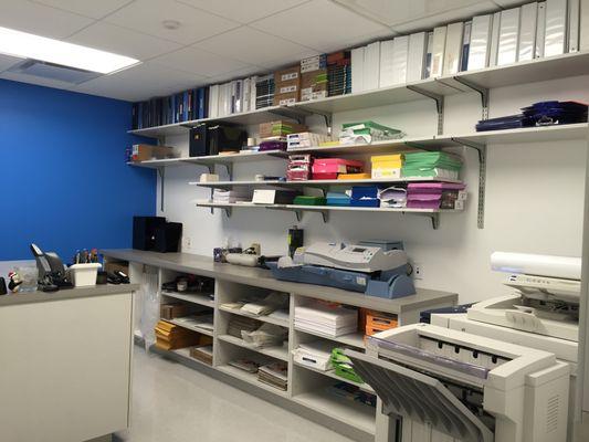 Complete set up of an office supply room after a company move.