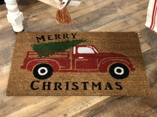 We carry super cute door mats.