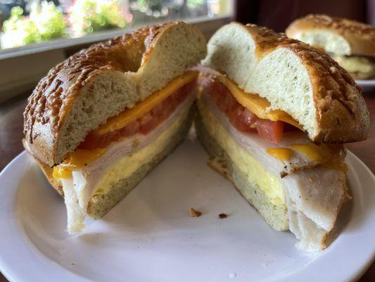 Eggwich with turkey, tomato and spinach Asiago bagel