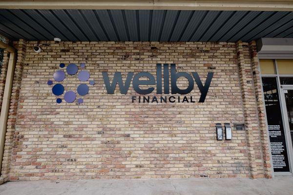 Exterior signage of Wellby Financial in Houston Park Place