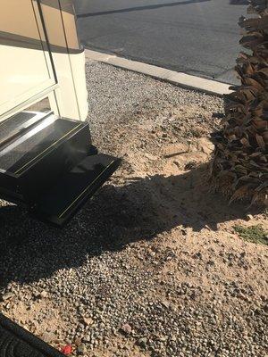 Our front door opening into a drainage ditch