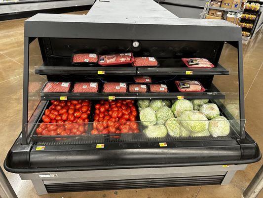 I'm sure the FSIS would love this. Raw pork on the same shelf as raw beef above fresh fruits and vegetables. Food safety nightmare