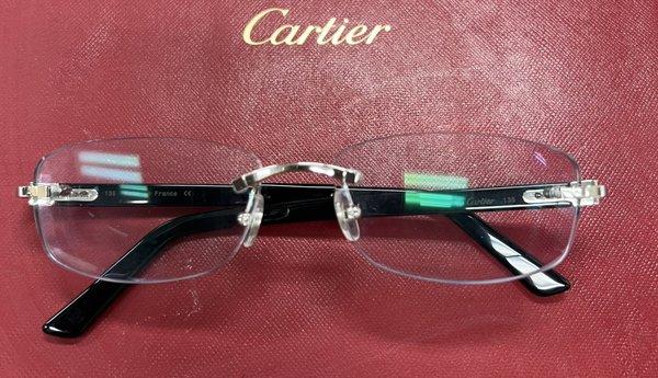 Cartier frameless glasses - see Adam Sandler in his recent jewelry movie!