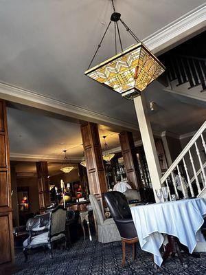 Sitting area and stairs leading up to the olive room