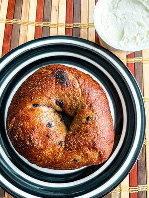 Blueberry bagel with honey brie schmear