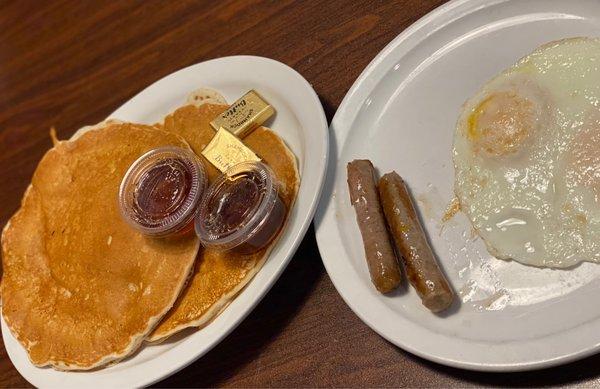 Pancake Sammy- two buttermilk pancakes, sausage, two eggs ($12.29)