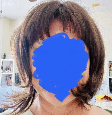 Result, clearly uneven in length and thickness   around entire head