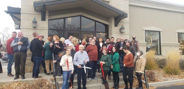 Red ribbon cutting with the Chamber of Commerce to celebrate 50th Anniversary!