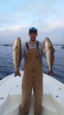 Two nice slot reds caught in the duck ponds of Delacroix with Louisiana Fishing Charters