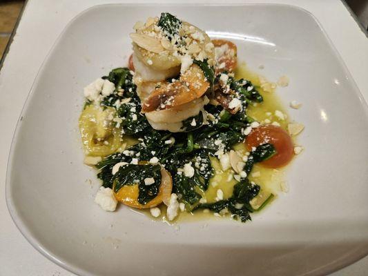 Sautéed shrimp with sautéed arugula and spinach