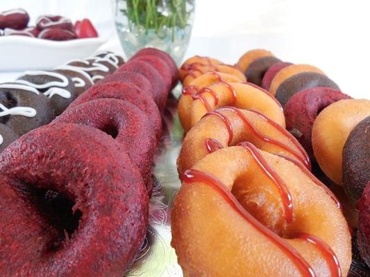 Vanilla and Red-Velvet Flavored Mini Cake donuts...with a delicious Raspberry topping