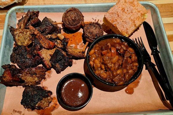 Burnt ends, BBQ beans, cornbread, and a couple of Moink balls.