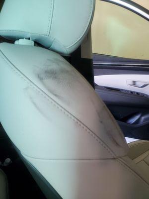 Left greasy handprints all over our grey leather