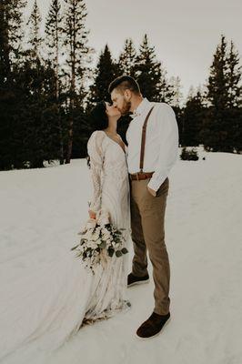 Snowy, winter elopement in the mountains. Colorado