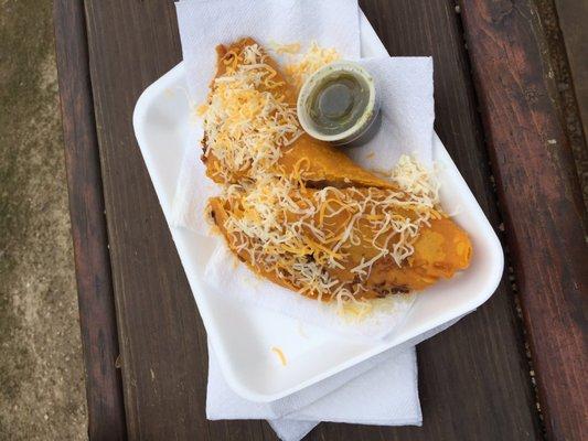 Loaded chicken, rice, coconut, and cheese empanada