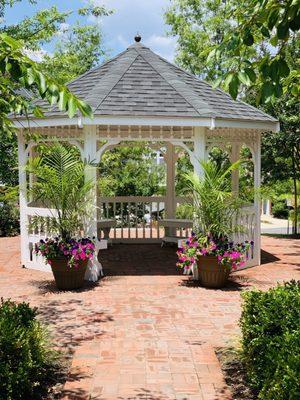 Replaced stamped concrete with colonial style bricks to match the surrounding homes