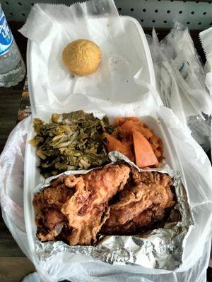 2 fried chicken breast with sweet potatoes and greens