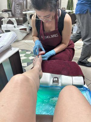 Rachel giving an epic pedicure.