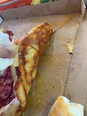 This pizza is covered in grease ! We even soaked up some of it & still soggy and drenched , this is just disgusting.