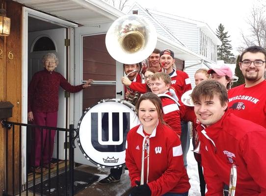 The UW Marching Band helped make a special delivery for Evening Meals on Wheels!