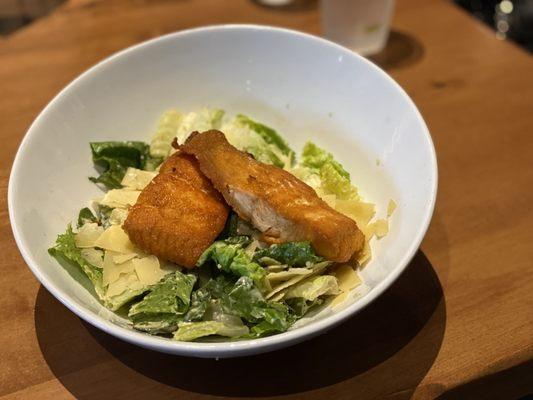 Caesar Salad with Salmon and grated Parmesan. No croutons for GF. The salmon goes well with my daughter's Mac n cheese .