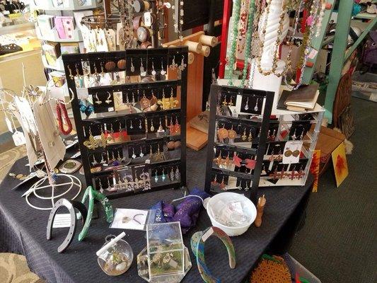 Awesome opossum Gifts has a wide variety of different artists who make different styles of jewelry.